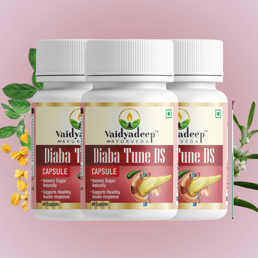 Three bottles of Vaidyadeep Diaba Tune DS capsules on a pink background with green leaves and flowers.